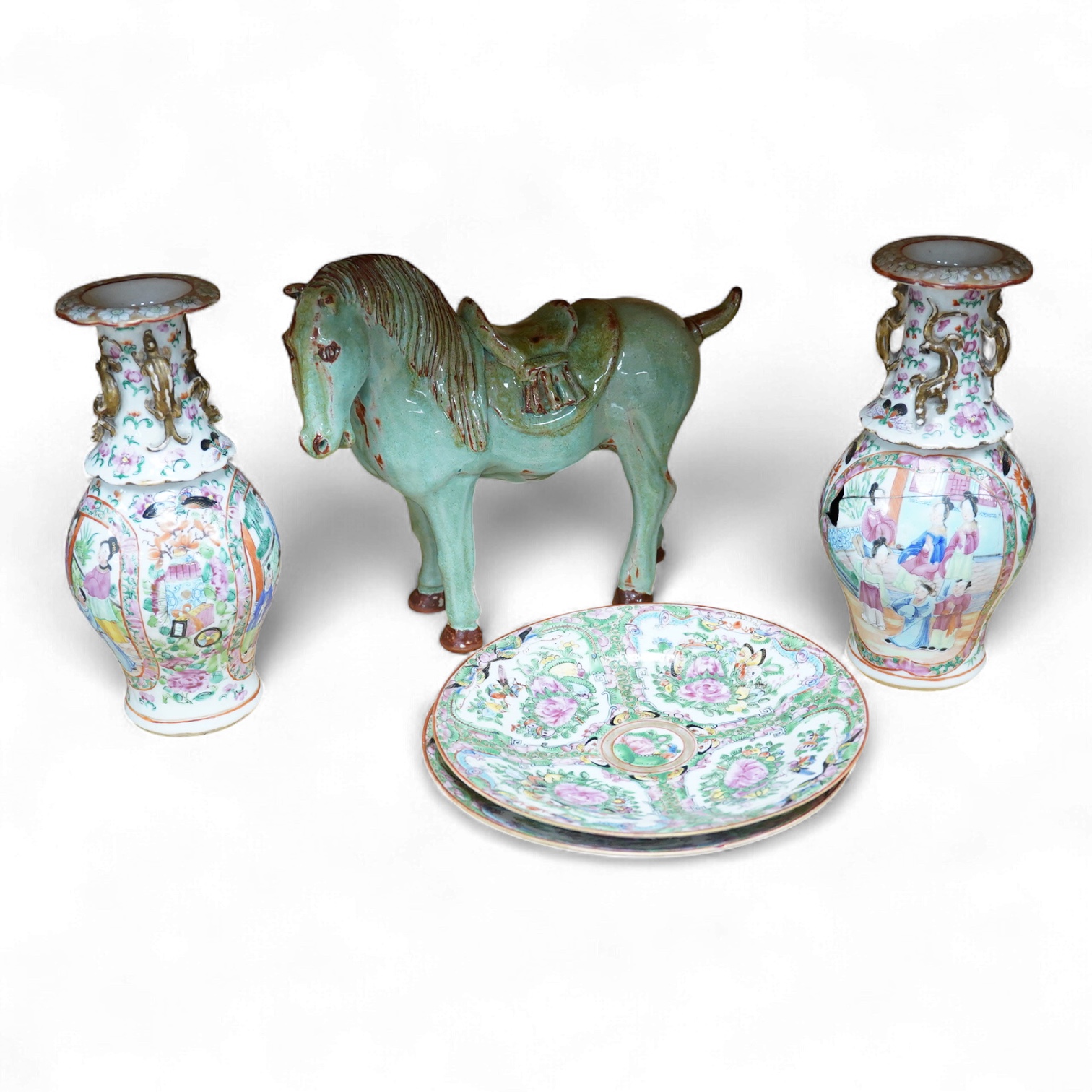 A pair of Chinese famille rose vases, two Canton plates and a green glazed horse, largest 29cm wide
